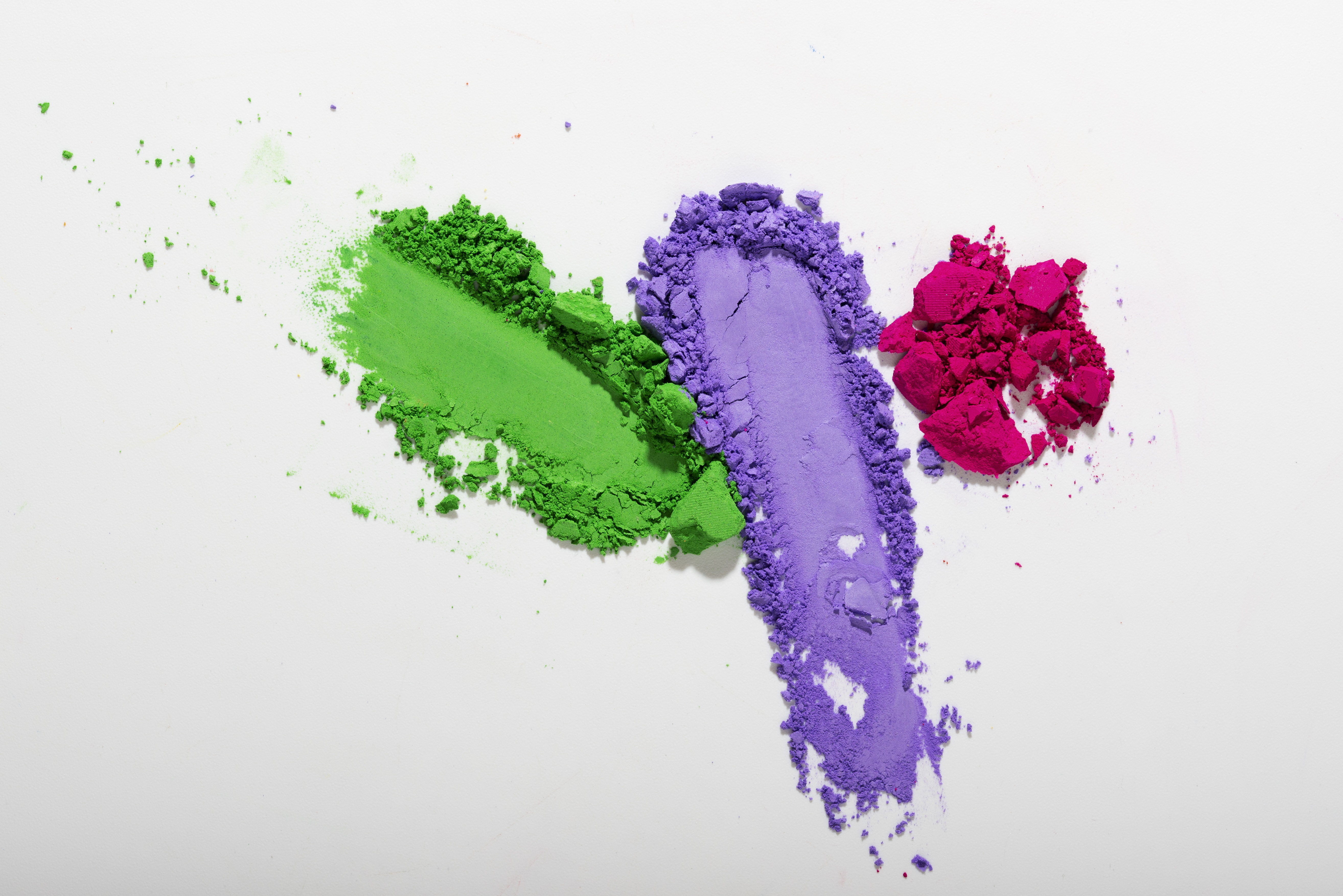 top-view-colorful-eyeshadow-white-background.jpg